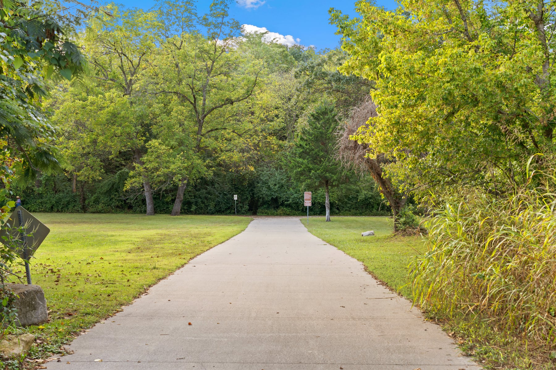 Tree-lined trail and open green space near Georgetown neighborhoods