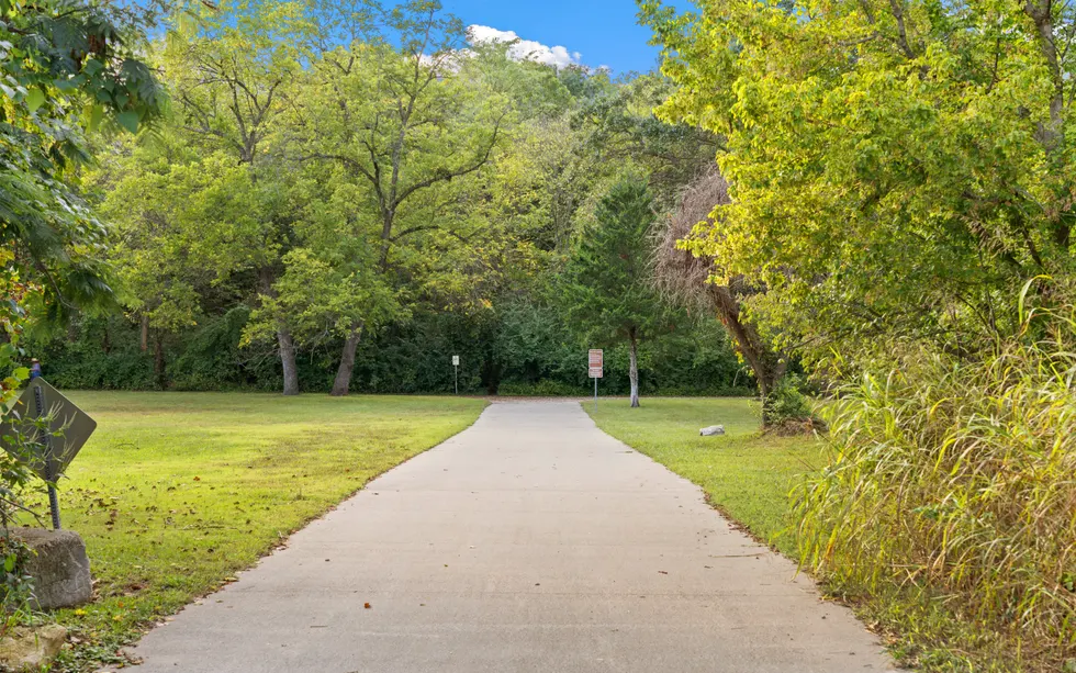 Tree-lined trail and open green space near Georgetown neighborhoods