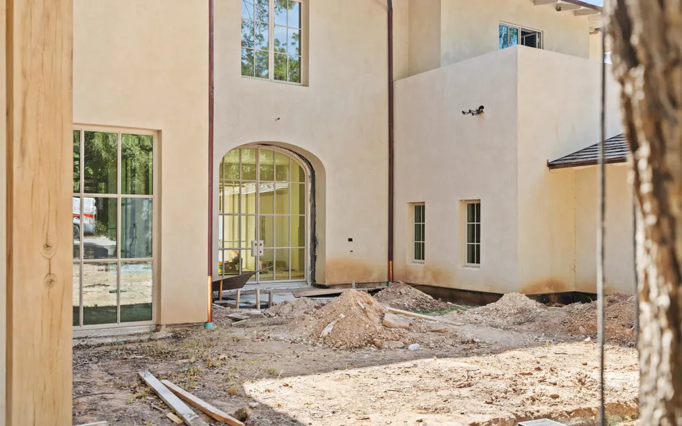 Central Texas new construction courtyard with exterior work in progress