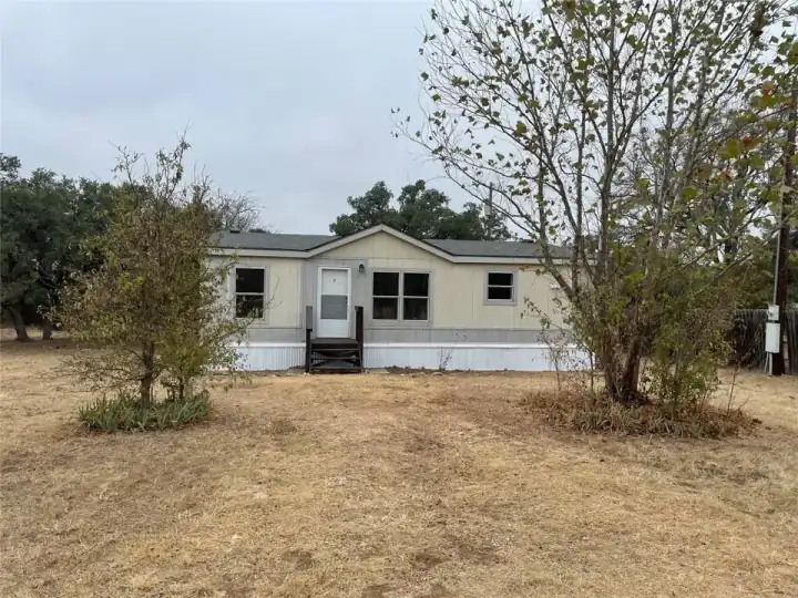 Home on acreage at 23003 Spanish Oak Trail in Leander