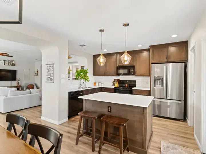Renovated kitchen and open living area at 4804 Woodstock Drive in Georgetown